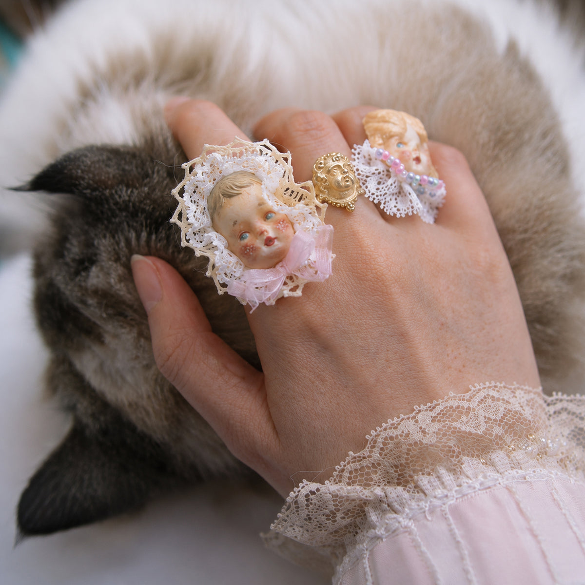Giant Baby & Pumpkin Head Doll Ring