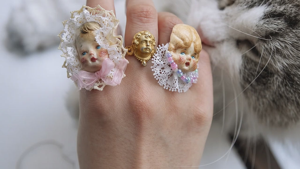Giant Baby & Pumpkin Head Doll Ring